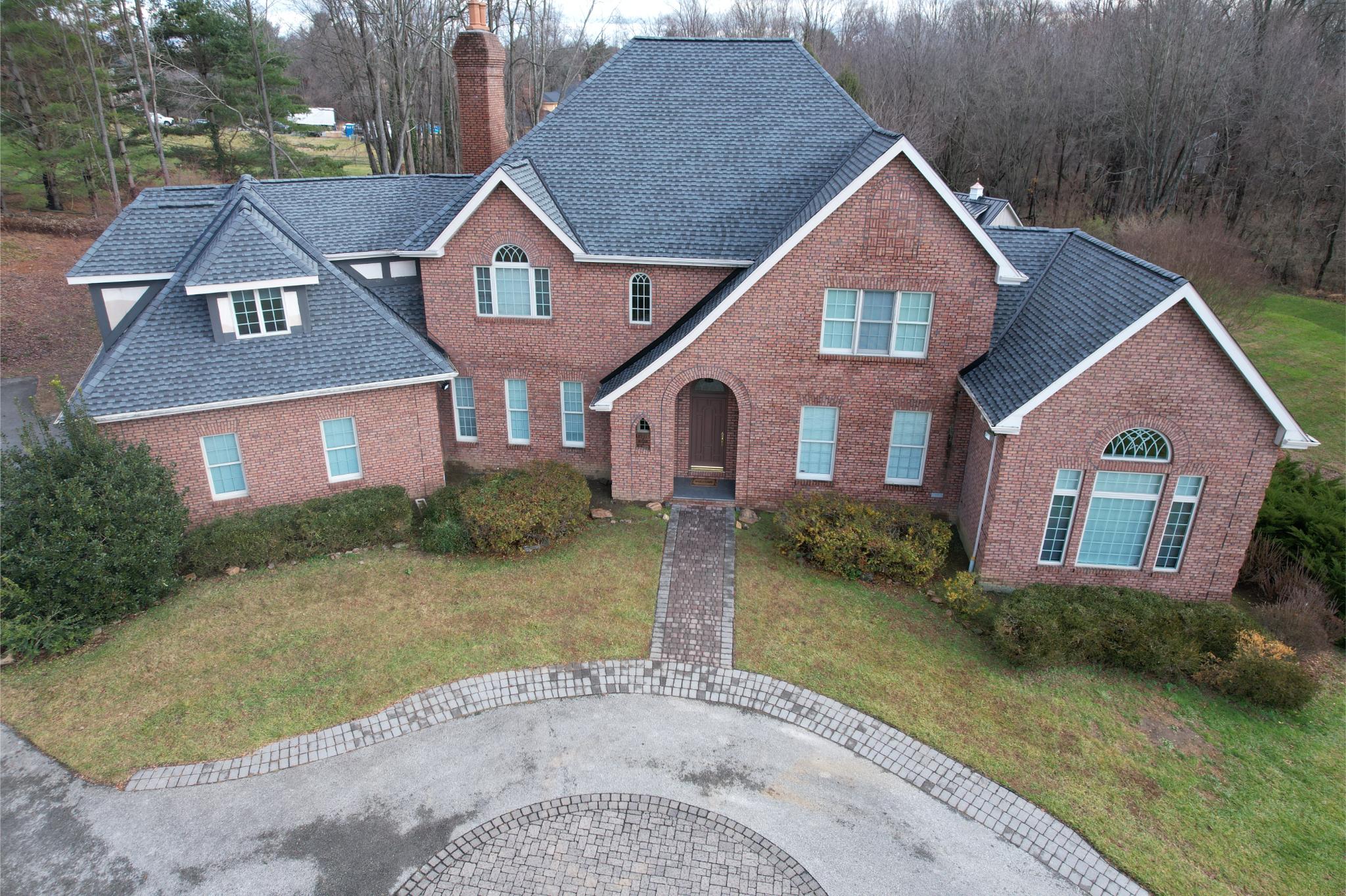 Roof repair in Newtown Square, PA completed on a two-story residential home