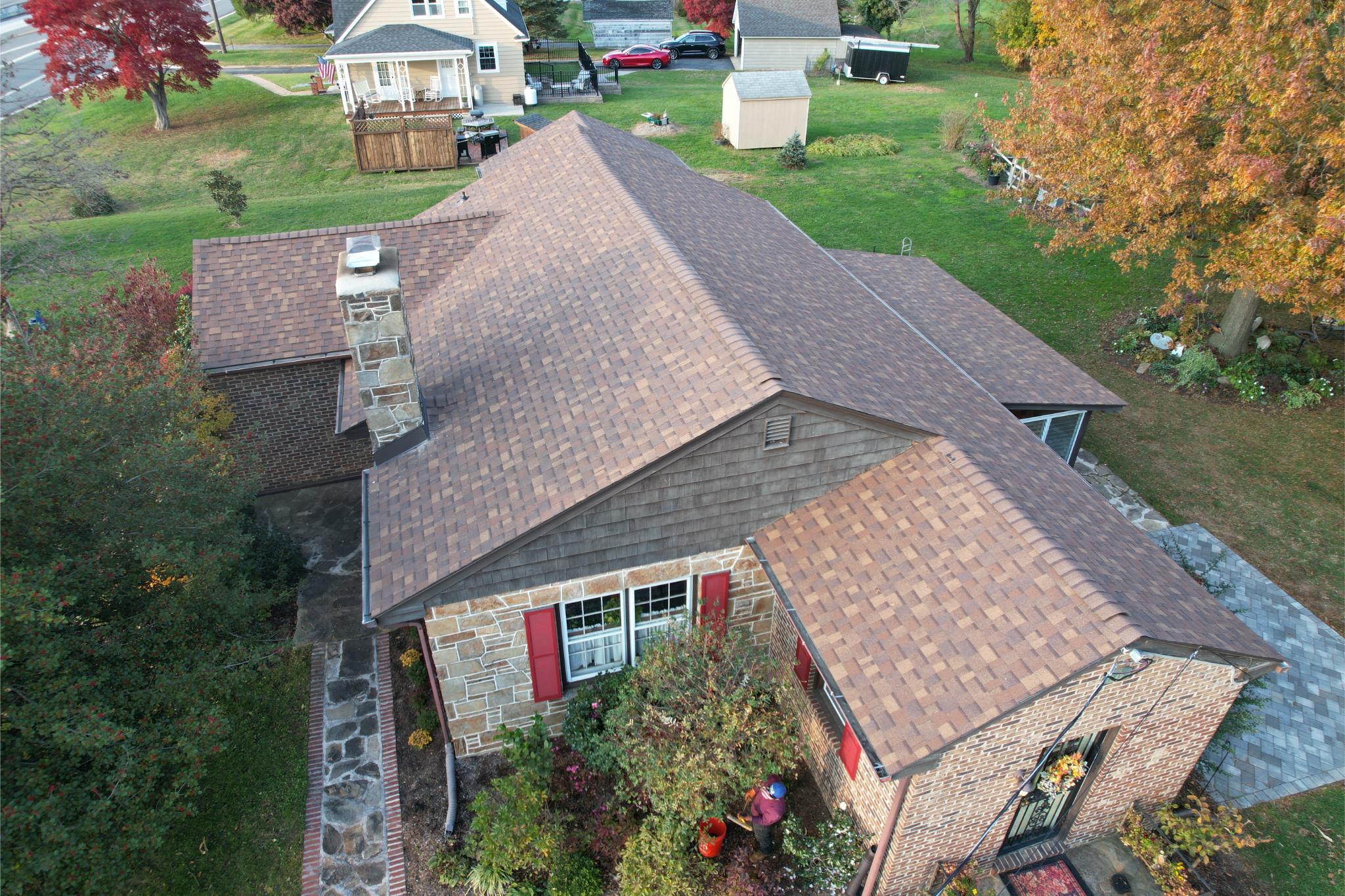 Roof repair services in Drexel Hill, PA restoring shingles and flashing on a residential home