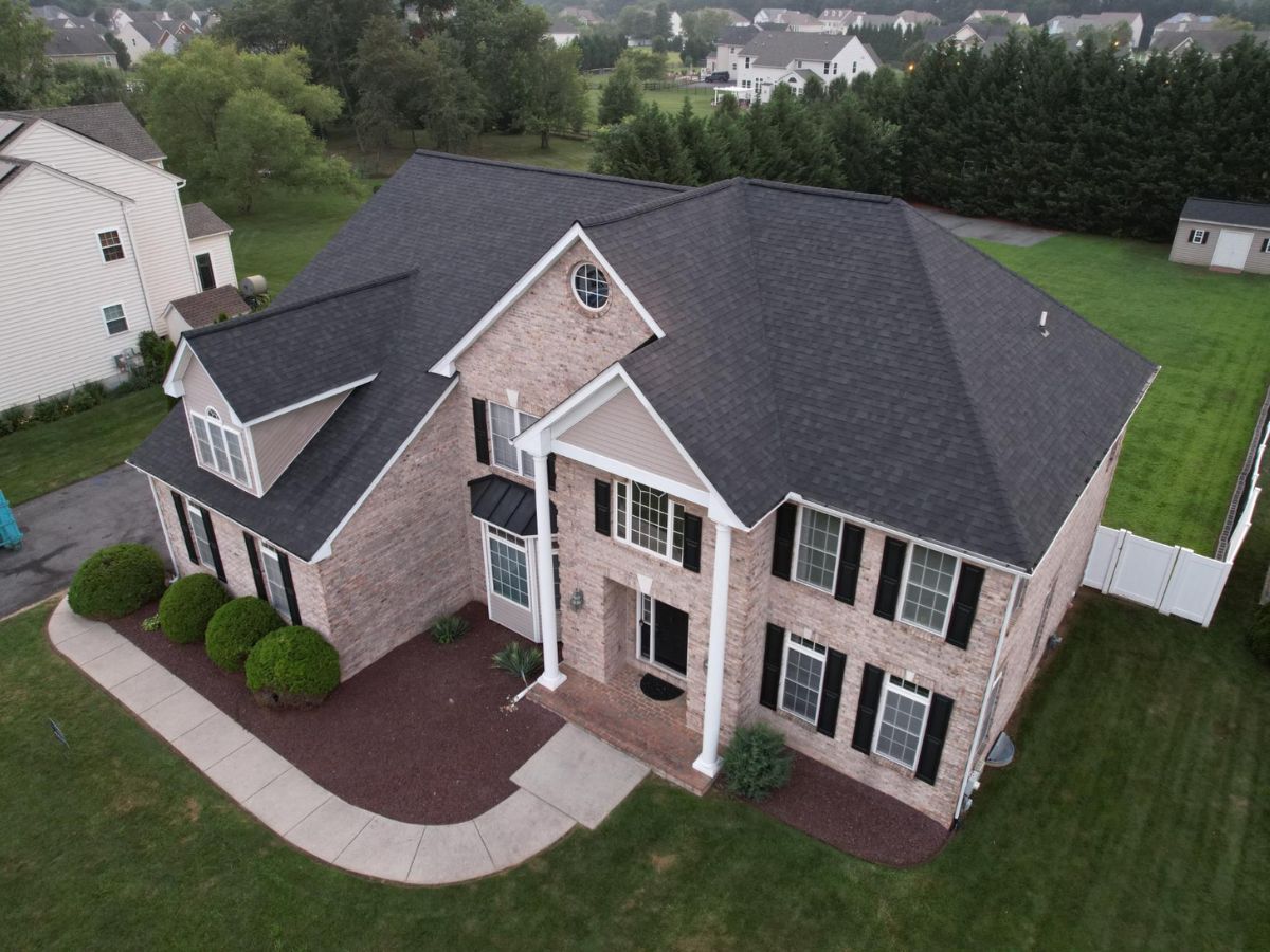 Completed gutter installation service in Glen Mills, PA protecting siding and foundation from runoff