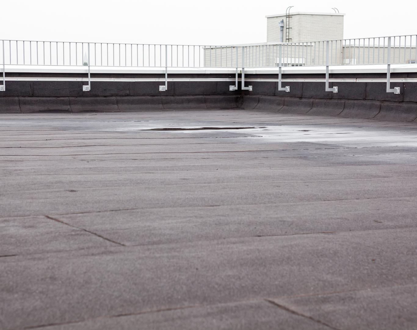 Professional commercial roofing service completed on a Newark business property